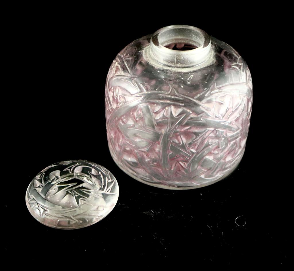 René Lalique. A pre-war amethyst tinted glass Épines pattern flacon, no.1, no.590, designed in 1920, 11.5cm high
